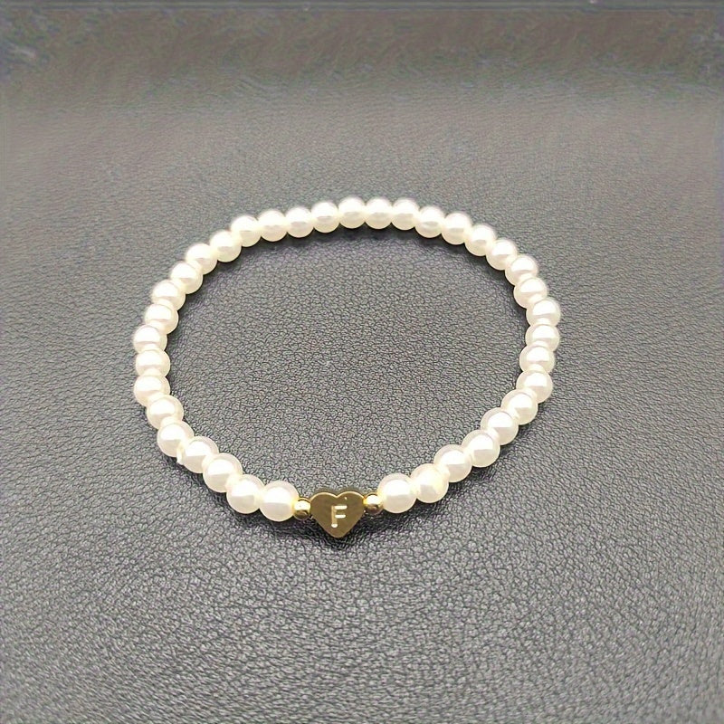 Elegancka bransoletka z sercem i inicjałem (A–Z)