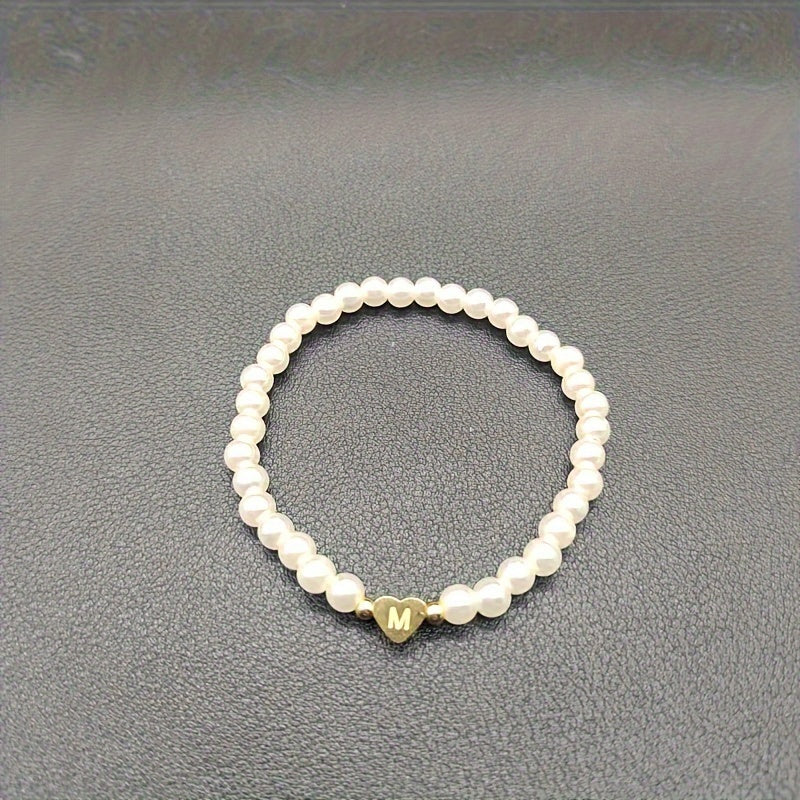 Elegancka bransoletka z sercem i inicjałem (A–Z)