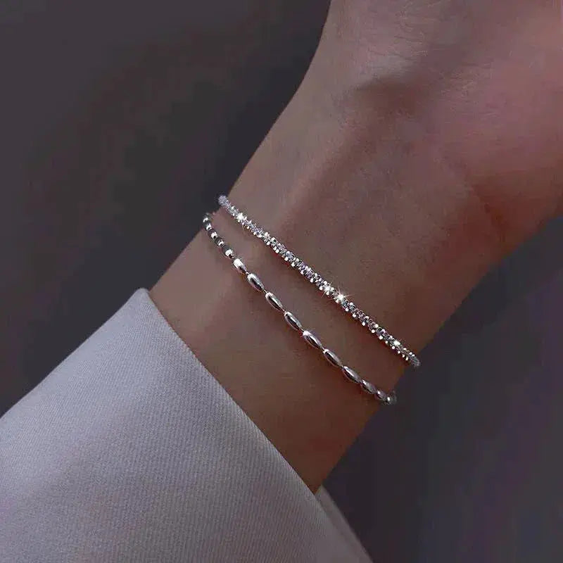 Elegancki zestaw srebrnych bransoletek z cyrkoniami
