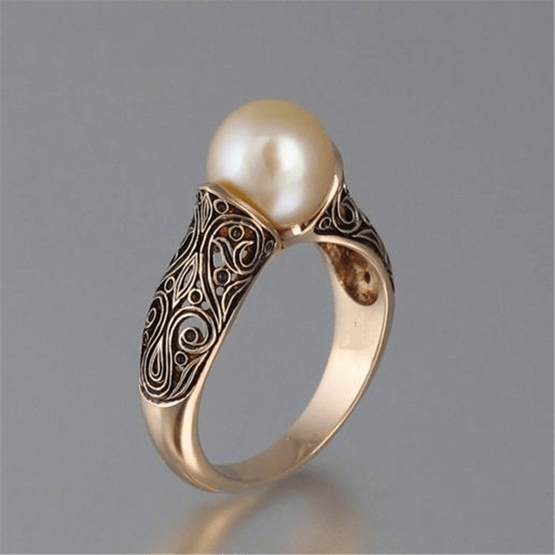 Vintage'owy złoty pierścionek z perłą