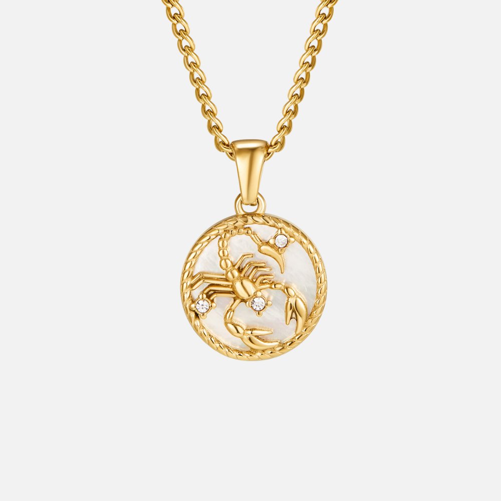 Łańcuszek z białą muszelką i monetą zodiaku „Regina“